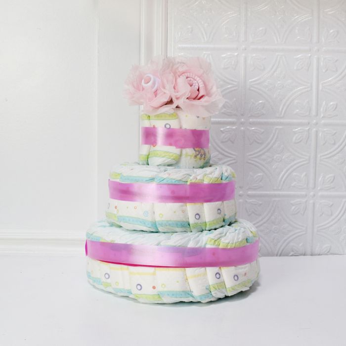 50 Diaper Baby Cake with Sock Roses, Huggies Little Snugglers Included – gift basket with sock roses and diaper cake